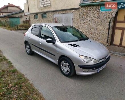 Серый Пежо 206, объемом двигателя 1.39 л и пробегом 289 тыс. км за 2450 $, фото 4 на Automoto.ua
