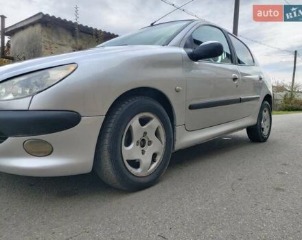 Серый Пежо 206, объемом двигателя 1.39 л и пробегом 289 тыс. км за 2750 $, фото 8 на Automoto.ua