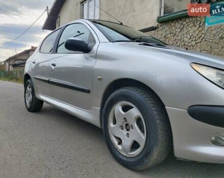 Серый Пежо 206, объемом двигателя 1.39 л и пробегом 289 тыс. км за 2550 $, фото 6 на Automoto.ua