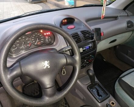 Серый Пежо 206, объемом двигателя 1.4 л и пробегом 127 тыс. км за 3450 $, фото 2 на Automoto.ua