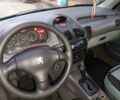 Серый Пежо 206, объемом двигателя 1.4 л и пробегом 127 тыс. км за 3450 $, фото 2 на Automoto.ua