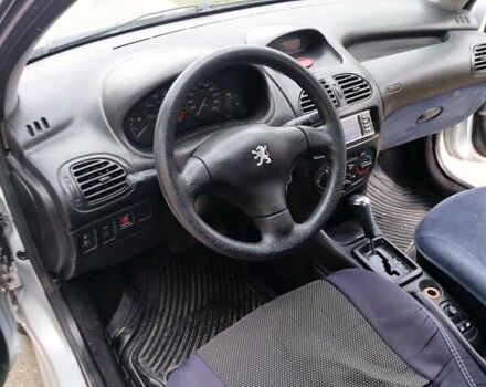 Серый Пежо 206, объемом двигателя 1.39 л и пробегом 289 тыс. км за 2750 $, фото 20 на Automoto.ua