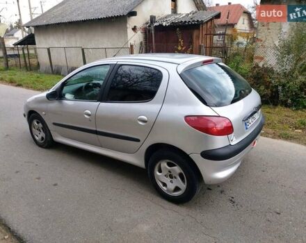 Серый Пежо 206, объемом двигателя 1.39 л и пробегом 289 тыс. км за 2750 $, фото 18 на Automoto.ua