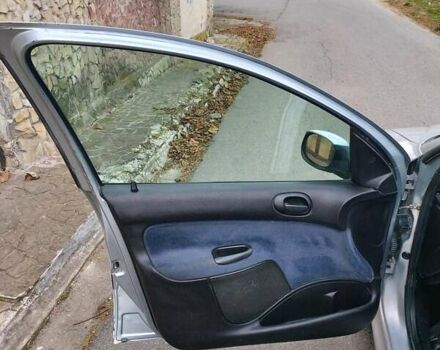 Серый Пежо 206, объемом двигателя 1.39 л и пробегом 289 тыс. км за 2750 $, фото 19 на Automoto.ua