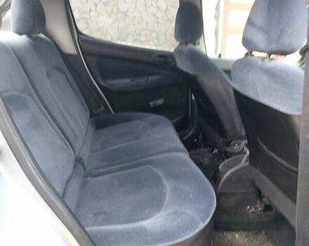 Серый Пежо 206, объемом двигателя 1.39 л и пробегом 289 тыс. км за 2450 $, фото 27 на Automoto.ua