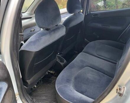 Серый Пежо 206, объемом двигателя 1.39 л и пробегом 289 тыс. км за 2550 $, фото 26 на Automoto.ua