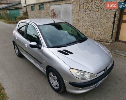 Серый Пежо 206, объемом двигателя 1.39 л и пробегом 289 тыс. км за 2450 $, фото 1 на Automoto.ua