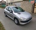Серый Пежо 206, объемом двигателя 1.39 л и пробегом 289 тыс. км за 2450 $, фото 2 на Automoto.ua