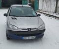 Сірий Пежо 206, об'ємом двигуна 1.2 л та пробігом 294 тис. км за 1800 $, фото 1 на Automoto.ua