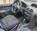 Серый Пежо 206, объемом двигателя 1.39 л и пробегом 289 тыс. км за 2750 $, фото 24 на Automoto.ua