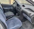 Серый Пежо 206, объемом двигателя 1.39 л и пробегом 289 тыс. км за 2450 $, фото 22 на Automoto.ua