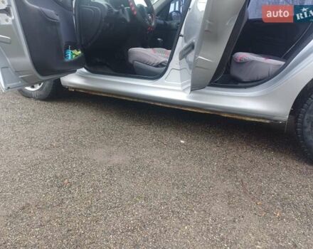 Серый Пежо 206, объемом двигателя 1.36 л и пробегом 230 тыс. км за 2349 $, фото 14 на Automoto.ua