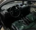 Серый Пежо 206, объемом двигателя 0 л и пробегом 200 тыс. км за 650 $, фото 6 на Automoto.ua