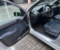 Серый Пежо 206, объемом двигателя 1.36 л и пробегом 173 тыс. км за 2000 $, фото 5 на Automoto.ua