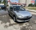 Серый Пежо 206, объемом двигателя 1.1 л и пробегом 211 тыс. км за 2000 $, фото 3 на Automoto.ua