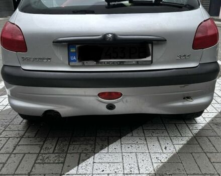 Серый Пежо 206, объемом двигателя 1.36 л и пробегом 173 тыс. км за 2000 $, фото 1 на Automoto.ua