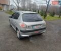 Серый Пежо 206, объемом двигателя 1.36 л и пробегом 230 тыс. км за 2349 $, фото 1 на Automoto.ua