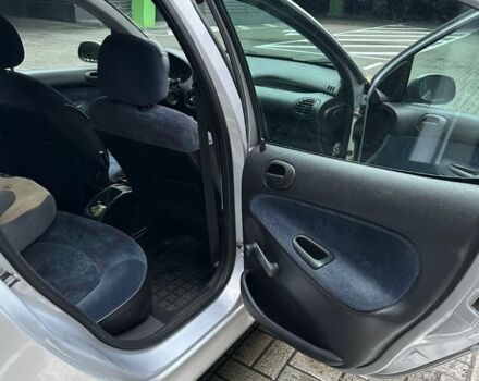 Серый Пежо 206, объемом двигателя 1.36 л и пробегом 173 тыс. км за 2000 $, фото 7 на Automoto.ua