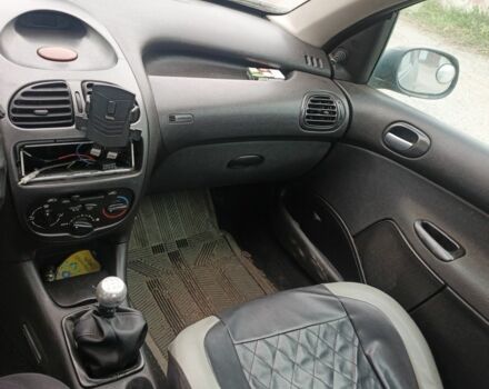 Серый Пежо 206, объемом двигателя 2 л и пробегом 300 тыс. км за 1500 $, фото 4 на Automoto.ua