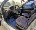 Серый Пежо 206, объемом двигателя 1.4 л и пробегом 270 тыс. км за 2800 $, фото 7 на Automoto.ua
