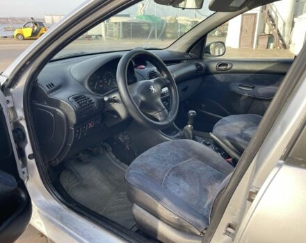 Серый Пежо 206, объемом двигателя 1.9 л и пробегом 200 тыс. км за 1299 $, фото 10 на Automoto.ua