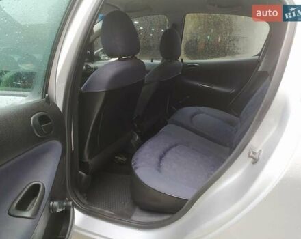 Сірий Пежо 206, об'ємом двигуна 1.36 л та пробігом 340 тис. км за 2950 $, фото 20 на Automoto.ua