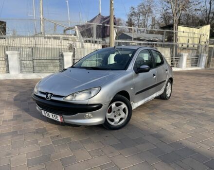Серый Пежо 206, объемом двигателя 1.9 л и пробегом 200 тыс. км за 1299 $, фото 1 на Automoto.ua