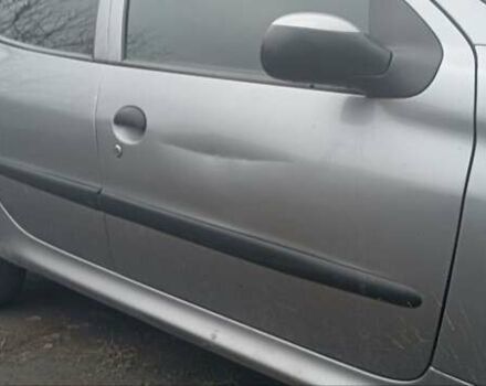Сірий Пежо 206, об'ємом двигуна 1.4 л та пробігом 210 тис. км за 3200 $, фото 5 на Automoto.ua