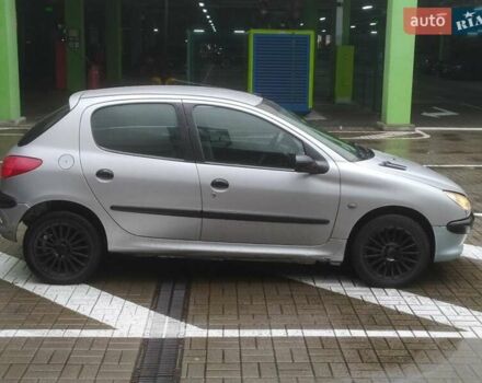Сірий Пежо 206, об'ємом двигуна 1.36 л та пробігом 340 тис. км за 2950 $, фото 1 на Automoto.ua