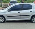 Серый Пежо 206, объемом двигателя 1.4 л и пробегом 270 тыс. км за 2800 $, фото 4 на Automoto.ua