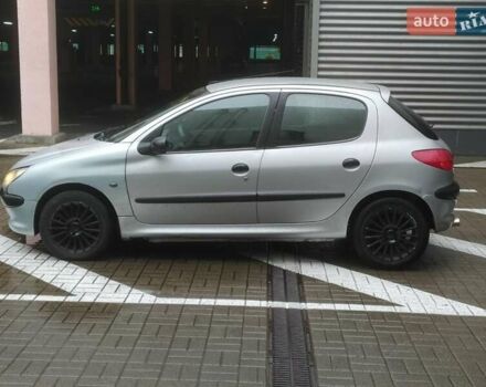 Сірий Пежо 206, об'ємом двигуна 1.36 л та пробігом 340 тис. км за 2950 $, фото 5 на Automoto.ua