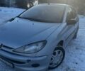 Серый Пежо 206, объемом двигателя 1.4 л и пробегом 250 тыс. км за 2428 $, фото 1 на Automoto.ua