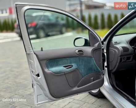 Серый Пежо 206, объемом двигателя 1.4 л и пробегом 221 тыс. км за 2450 $, фото 42 на Automoto.ua