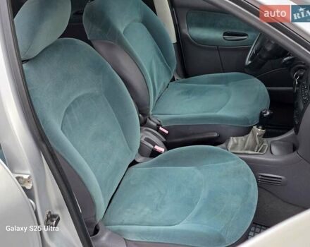 Серый Пежо 206, объемом двигателя 1.4 л и пробегом 221 тыс. км за 2450 $, фото 23 на Automoto.ua