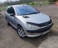 Серый Пежо 206, объемом двигателя 1.4 л и пробегом 369 тыс. км за 2500 $, фото 1 на Automoto.ua