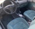 Серый Пежо 206, объемом двигателя 1.4 л и пробегом 327 тыс. км за 3100 $, фото 3 на Automoto.ua
