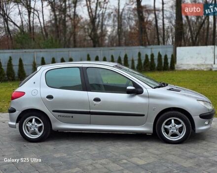Серый Пежо 206, объемом двигателя 1.4 л и пробегом 221 тыс. км за 2450 $, фото 6 на Automoto.ua