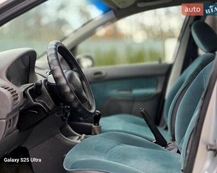 Серый Пежо 206, объемом двигателя 1.4 л и пробегом 221 тыс. км за 2450 $, фото 45 на Automoto.ua