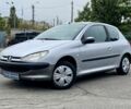 Серый Пежо 206, объемом двигателя 1.1 л и пробегом 187 тыс. км за 2300 $, фото 1 на Automoto.ua