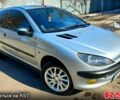 Серый Пежо 206, объемом двигателя 1.4 л и пробегом 250 тыс. км за 4000 $, фото 1 на Automoto.ua
