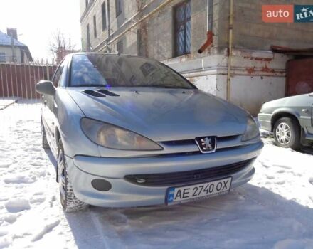 Серый Пежо 206, объемом двигателя 1.4 л и пробегом 244 тыс. км за 3300 $, фото 1 на Automoto.ua