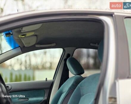 Серый Пежо 206, объемом двигателя 1.4 л и пробегом 221 тыс. км за 2450 $, фото 44 на Automoto.ua