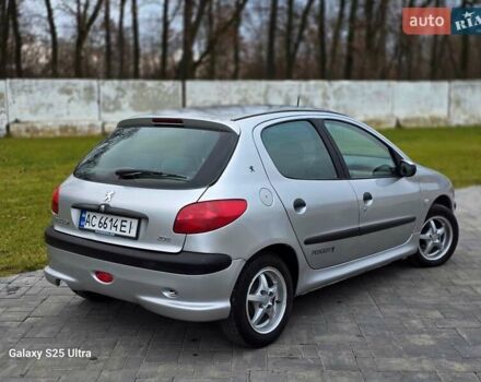 Серый Пежо 206, объемом двигателя 1.4 л и пробегом 221 тыс. км за 2450 $, фото 11 на Automoto.ua