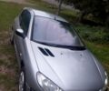 Серый Пежо 206, объемом двигателя 1.4 л и пробегом 240 тыс. км за 3499 $, фото 1 на Automoto.ua