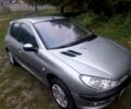 Серый Пежо 206, объемом двигателя 1.4 л и пробегом 240 тыс. км за 3100 $, фото 1 на Automoto.ua