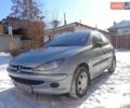 Серый Пежо 206, объемом двигателя 1.4 л и пробегом 244 тыс. км за 3300 $, фото 1 на Automoto.ua