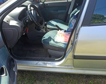 Серый Пежо 206, объемом двигателя 1.4 л и пробегом 250 тыс. км за 1000 $, фото 2 на Automoto.ua