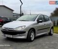 Серый Пежо 206, объемом двигателя 1.4 л и пробегом 221 тыс. км за 2450 $, фото 1 на Automoto.ua