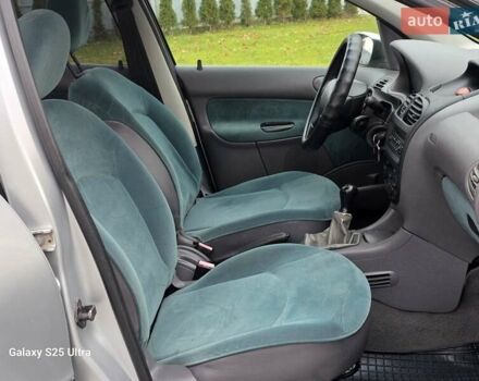 Серый Пежо 206, объемом двигателя 1.4 л и пробегом 221 тыс. км за 2450 $, фото 22 на Automoto.ua