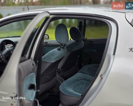 Серый Пежо 206, объемом двигателя 1.4 л и пробегом 221 тыс. км за 2450 $, фото 37 на Automoto.ua